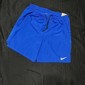 Blue nike mens track running shorts